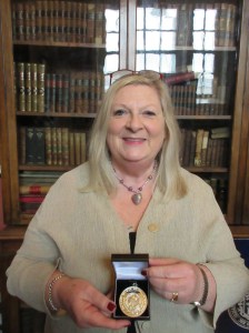 Marita with her Edmund Burke Medal from Trinity College Dublin